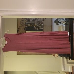 Sleeveless shift dress with pockets